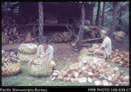 Tongi and wife preparing coconut for drying, Upolu, Samoa