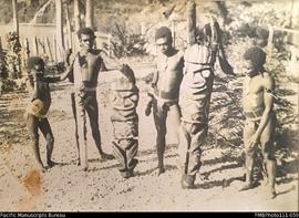 'Men Laus with demes. M'batru, Nahapndal and demes loulou. 12/12/41', men with tree fern figures,...