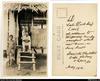 "H.D. [Henry Dexter], Laki (Cookboy) & dog at entrance to temporary humpy occupied while...