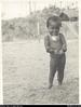 Young child wearing shell, Kerawagi, Chimbu. Shell denotes status/buying power. Same girl as in N...
