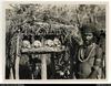 Native of Lulamai, brother of fellow in No.200, at shrine of skull of male ancestors on track sou...