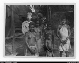 Soldier [US?] with women and children, Lehi on left and Chrissie just behind, Malekula