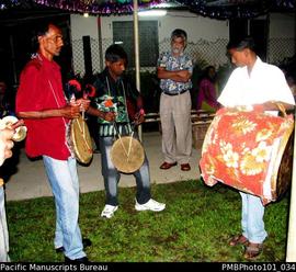 [Suva Wedding Two drummers using traditional instruments, playing at great speed.]