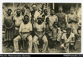 Postcard of Onua Pangkumu with Pastor Juda, Rev F.J. Paton, Juda and a group of villagers