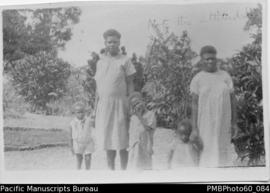 Two ni-Vanuatu women and children