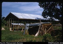 [Structure with corrugated iron roof]