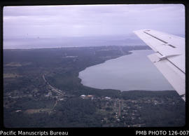 'Aerial view over Ha'ateiho village to Nuku'alofa, with lagoon on right, Tonga'
