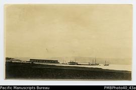 ‘Rabaul Harbor. H.M.S. Una late German yacht Komot[?]. 1914. R.G. Bowen.’ [Photo print.]