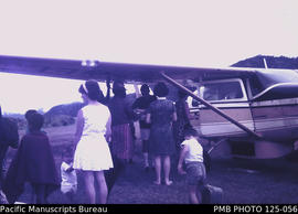 'Baiyer River, Baptist Mission: Missionary Aviation Fellowship [MAF] plane greeted by mission fam...