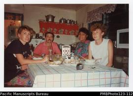 Pam, Richard, Tautino, and Yvonne around the kitchen table. Satupaitea, Savaii