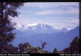 [Clouds and glacier above Freeport’s Grasberg mine, off Puncak Jaya]