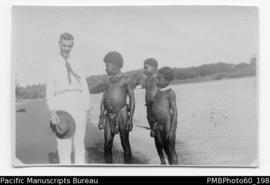 Mr Paton with three ni-Vanuatu boys
