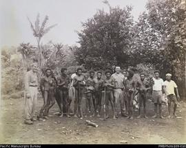 'Matson poses', Lieutenant E. Matson with Big Nambas men, Malekula