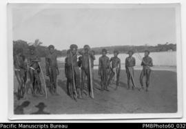 ni-Vanuatu men with their fishing  spears