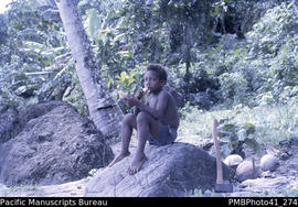 'Boy with coconuts – refreshment, Guadalcanal West'