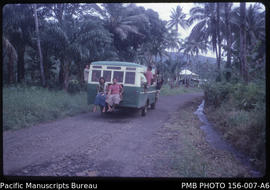 Overloaded bus headed for Apia, from Falevao village, inland from Falefa, Upolu, Samoa