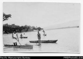 ni-Vanuatu Boys on local model canoes
