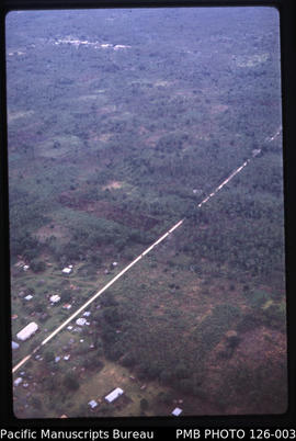 'Aerial view of road, farming and villages at eastern end of Tongatapu, Tonga'