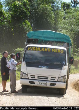 [Inland from Colo-I-Suva, Chris Gregory and Brij Lal talking to driver of the "Highland Hero...