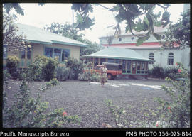 Houses next to church, Upolu, Samoa
