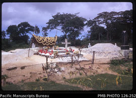 'Contemporary graves in front of one of Langi near Mua village, Tonga'