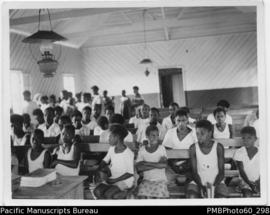 School children in a classroom in Aulua