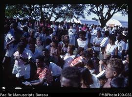 "Onlookers at Good Friday Easter procession, Honiara, in front of Public Works Department Qu...
