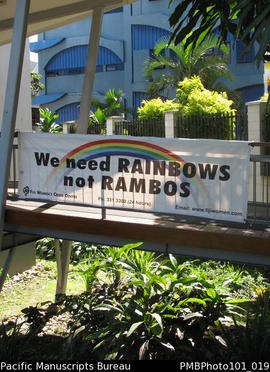 [Suva Banner "We Need Rainbows Not Rambos" at the Fiji Women's Crisis Centre]