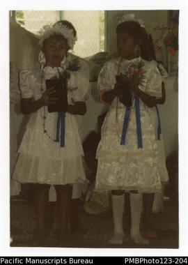 Ereni and Lotu during Lotu Tamaiti (White Sunday) at the Vaega Methodist Church, Savaii