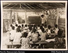 New Hebridean children learning to read and write, Lamenu, New Hebrides