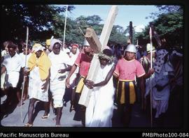 "Crowd in Good Friday Easter procession, Mendana Avenue, Honiara, pageant of Jesus carrying ...