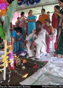 [Suva Wedding  Mahen the groom dressed in  wedding clothes and his mother (holding his hat) and o...