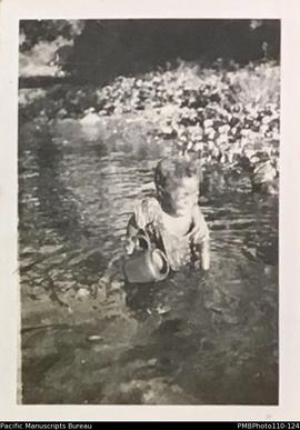 'As usual', young boy in river, Malekula