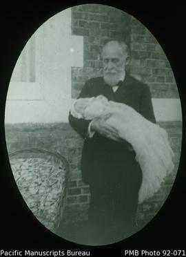 Rev P Milne and child of chinese missionary