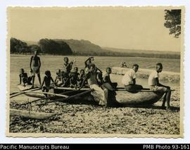 Group Photo Beside Outrigger Canoe