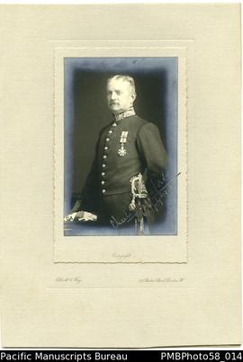 Portrait of C.M.Woodford, wearing the order of St.Michael and St.George medal, 6 Jul 1916 (facing...