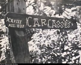 'Benauer. January 1941', wooden signpost inscribed Carcasses lying