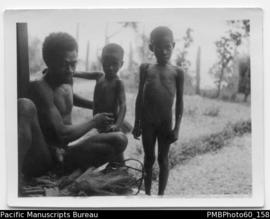 ni-Vanuatu man with two children