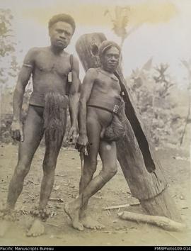 'Ankle bells and old dumdum', two men with wooden slit drum, Big Nambas area, Malekula