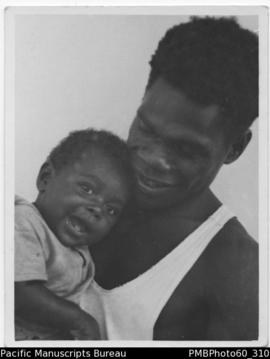 ni-Vanuatu father with child