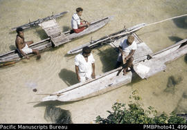 [Men and] Outrigger canoes built at Taumako, Duff Islands