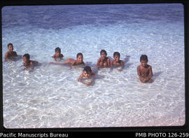 'Tongan children at the beach, Tonga'