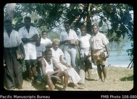 [ni-Vanuatu men standing on beach]