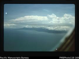 'Ambryn from air with cloud over volcanoes'
