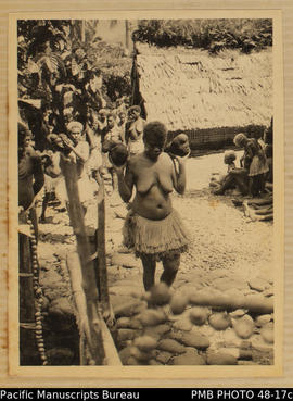 Women preparing to cook yams, Makaruka, Weather Coast