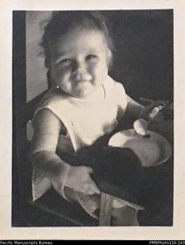 'Janet Margaret. November 1940 13 months.', with plate and spoon