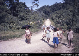 [People walking along] 'Road to Malu'u, Malaita'