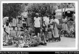 Tolai women vendors with taro and banana produce