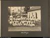 Rarotonga'. A formal group photograph of children and adults, including a European Minister, outs...