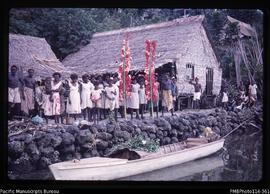 'A CFC service before a canoe leaves Sikile village for Kindu, Roviana Lagoon'